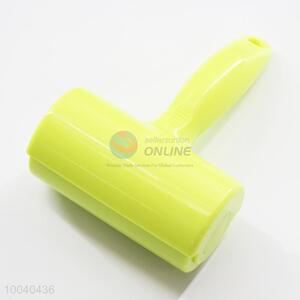 Green mini <em>lint</em> roller/dust remover