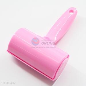 Pink mini <em>lint</em> roller/dust remover