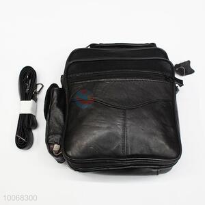 Black leather coin purse messenger bag with shoulder straps