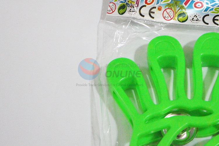 Wholesale Green Color Hand Shaped Hand Jingle Shaking Bell