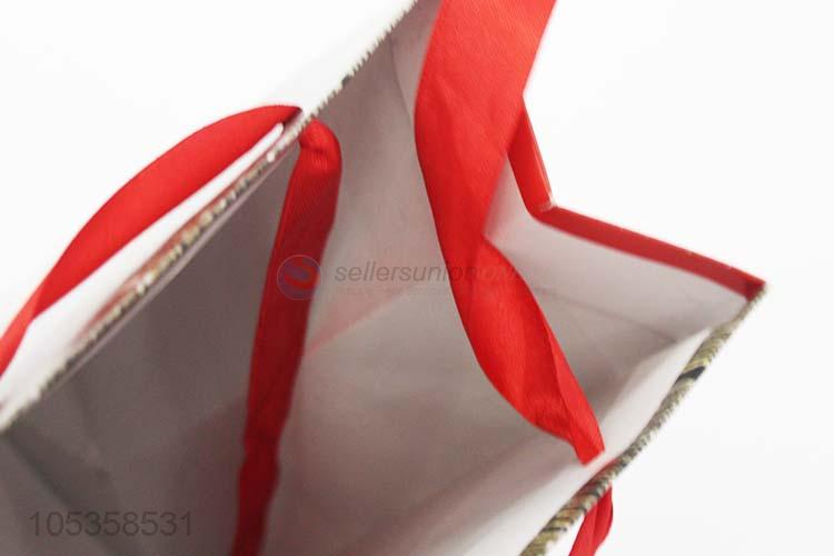 Manufacturer directly supply Christmas paper bag gift bag customized logo