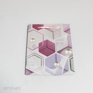 Creative design geometric pattern <em>paper</em> gift bag with <em>handles</em>