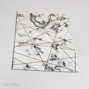 Creative design marble geometric pattern <em>paper</em> gift bag with <em>handles</em>