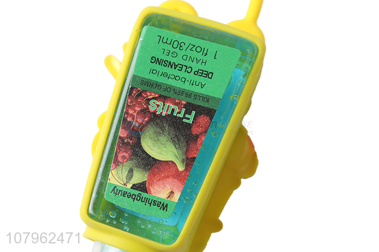 China wholesale fruits aroma hand sanitizer with cartoon silicone holder