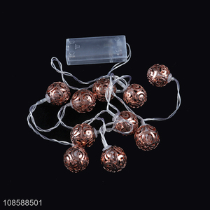 Wholesale AA battery operated rose gold hollowed-out metal ball led string light