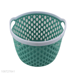 China wholesale plastic hollow round storage basket with handle