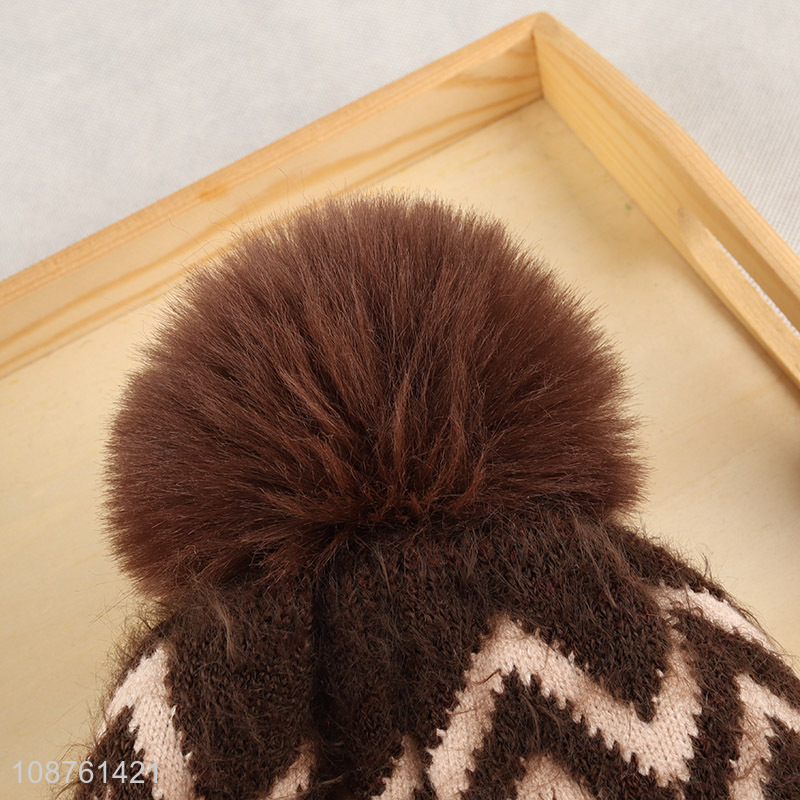 Factory price fluffy pom pom beanie winter hat with fleece lining