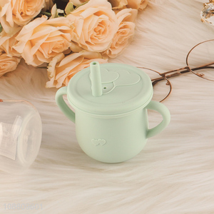Wholesale food grade 100% silicone baby training cup with <em>straw</em>