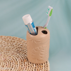 Hot selling embossed ceramic toothbrush holder organizer for bathroom
