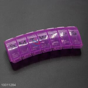Purple plastic 7-grid patient pill box