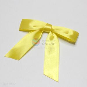 Multifunctional yellow decorative bowknot
