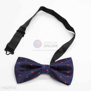 Dark blue with red dot bow tie