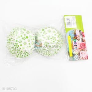 Fancy green flower printed cupcake wrappers cups