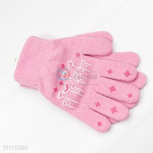 Pink knitted children gloves for girls