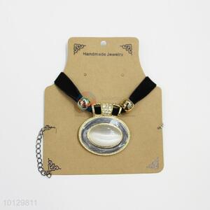 Black faux suede alloy necklace with big cat-eye stone