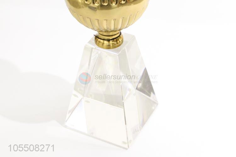 Customized golden iron candlestick with clear crystal base
