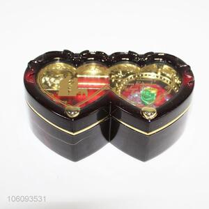 Factory price heart shape plastic music box
