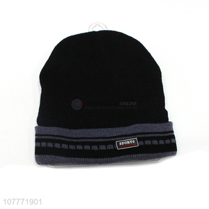 Wholesale plus velvet earmuffs solid color warm woolen hat cloth label knitted hat
