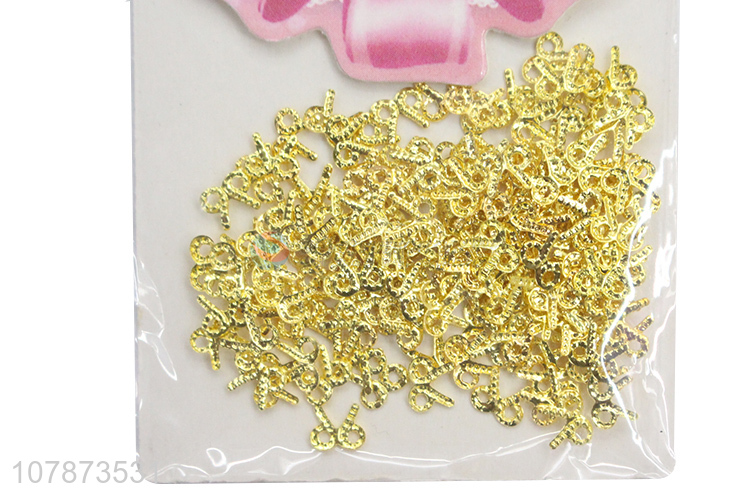 Yiwu wholesale golden bow decoration nail accessories for women