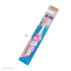 Low price pink plastic children toothbrush wholesale