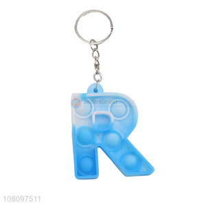 Factory price letter R mini rodent pioneer keychain vent toy