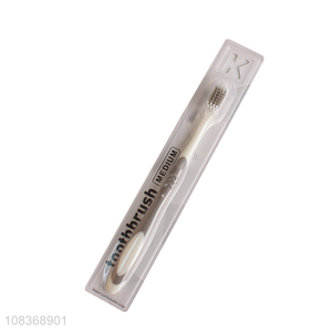 Hot sale medium bristle toothbrush with anti-slip plastic handle