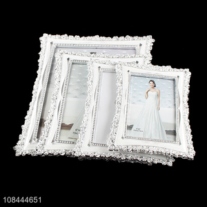 Best selling plating plastic tabletop photo frame with stander