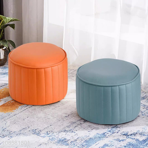 Good quality small round shoe changing stool upholstered footstool
