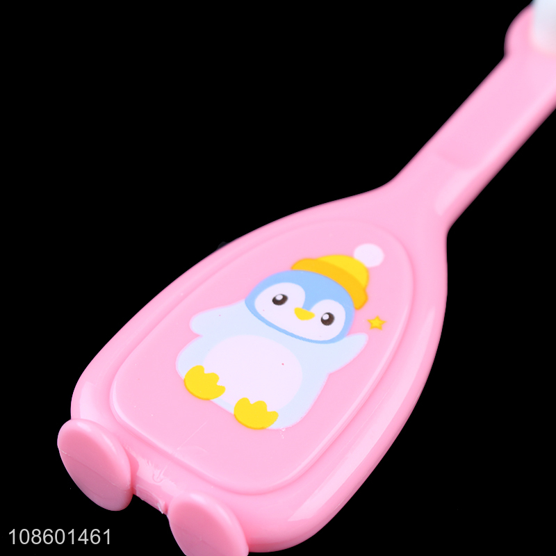 Hot selling cartoon penguin soft bristle toothbrush for kids