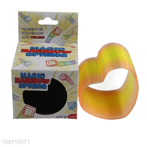 Factory price heart shape kids adult magic rainbow spring toys wholesale