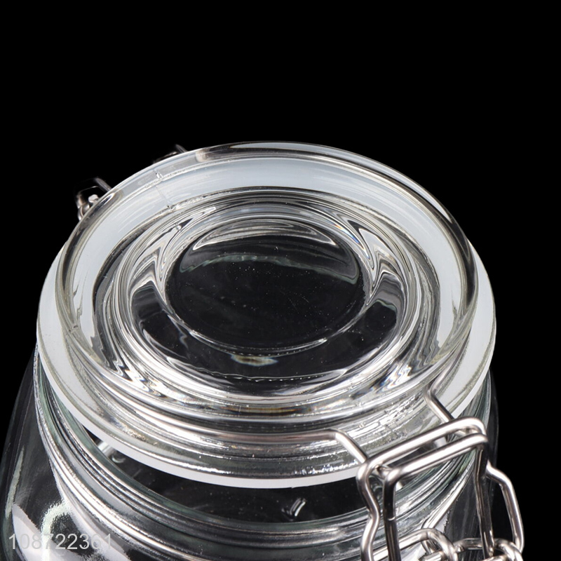 Low price glass clear flip top candy snack storage jar for kitchen