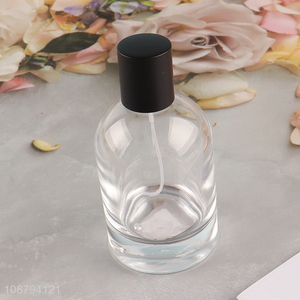 Online wholesale round clear glass perfume bottle