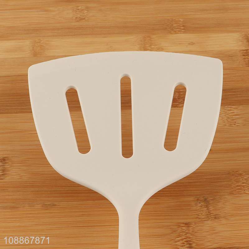 Good quality wide silicone slotted spatula for cooking fish and meat