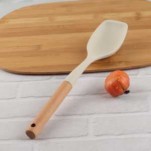 China imports solid kitchen spoon non-stick silicone spoon for cooking