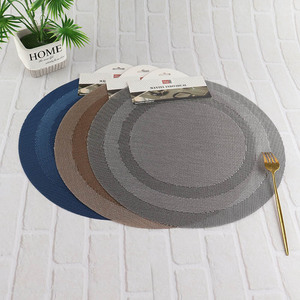 Wholesale round heat resistant wipeable pvc woven placemat for kitchen